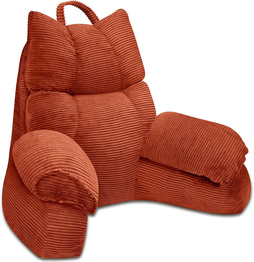 Brown ribbed lounge chair on a white background