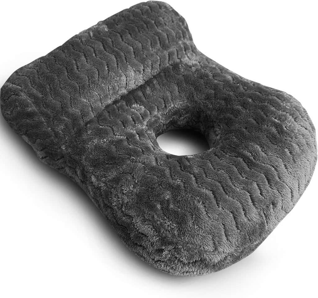 A dark gray plush lumbar pillow with a textured wavy pattern, shown on a clean white background.