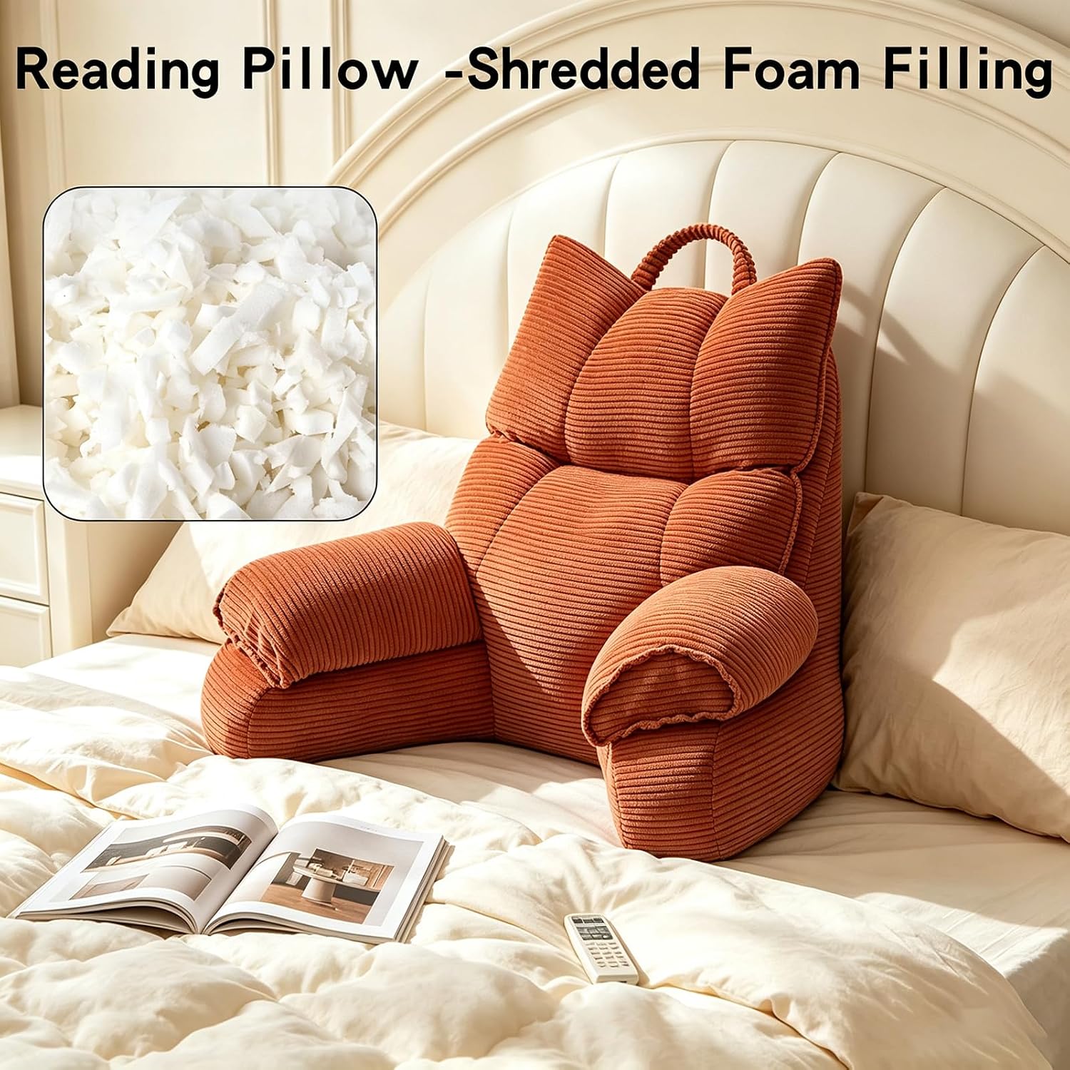 An orange-brown corduroy reading pillow shaped like a chair with a handle, shown on a bed. The image includes a text overlay reading 'Reading Pillow - Shredded Foam Filling' and a square inset showing white shredded foam pieces.