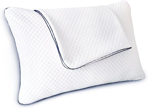 A white contoured pillow with a diamond-quilted texture and dark blue piping along the edges, shown on a plain white background.
