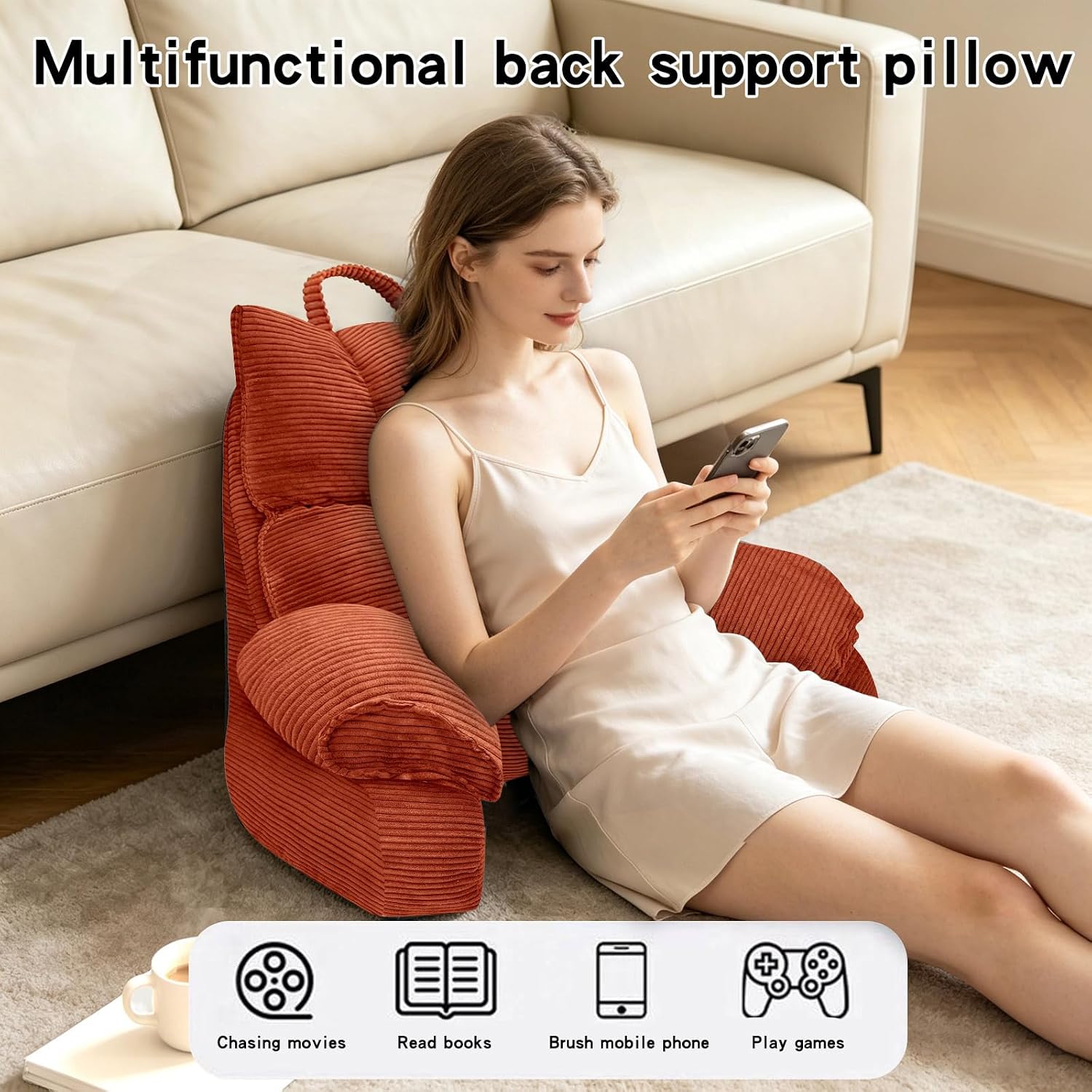 A woman sits on a beige sofa in a living room, leaning against a rust-orange corduroy back support pillow. The image includes text overlays reading 'Multifunctional back support pillow' and a feature summary at the bottom showing uses like watching movies, reading books, using a phone, and playing games.